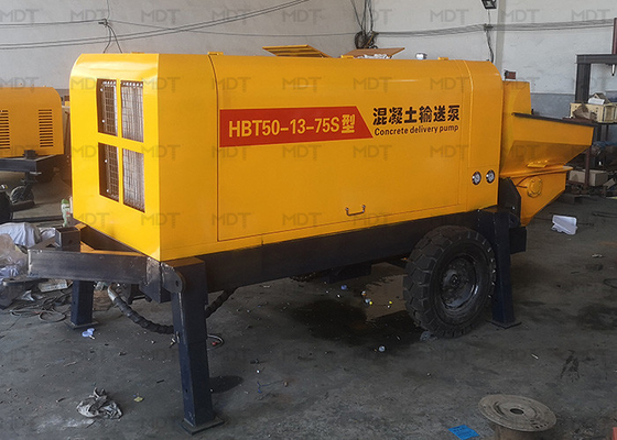 MDT-50 55KW पोर्टेबल कंक्रीट मिक्सर मशीन छोटे आकार का पीला रंग